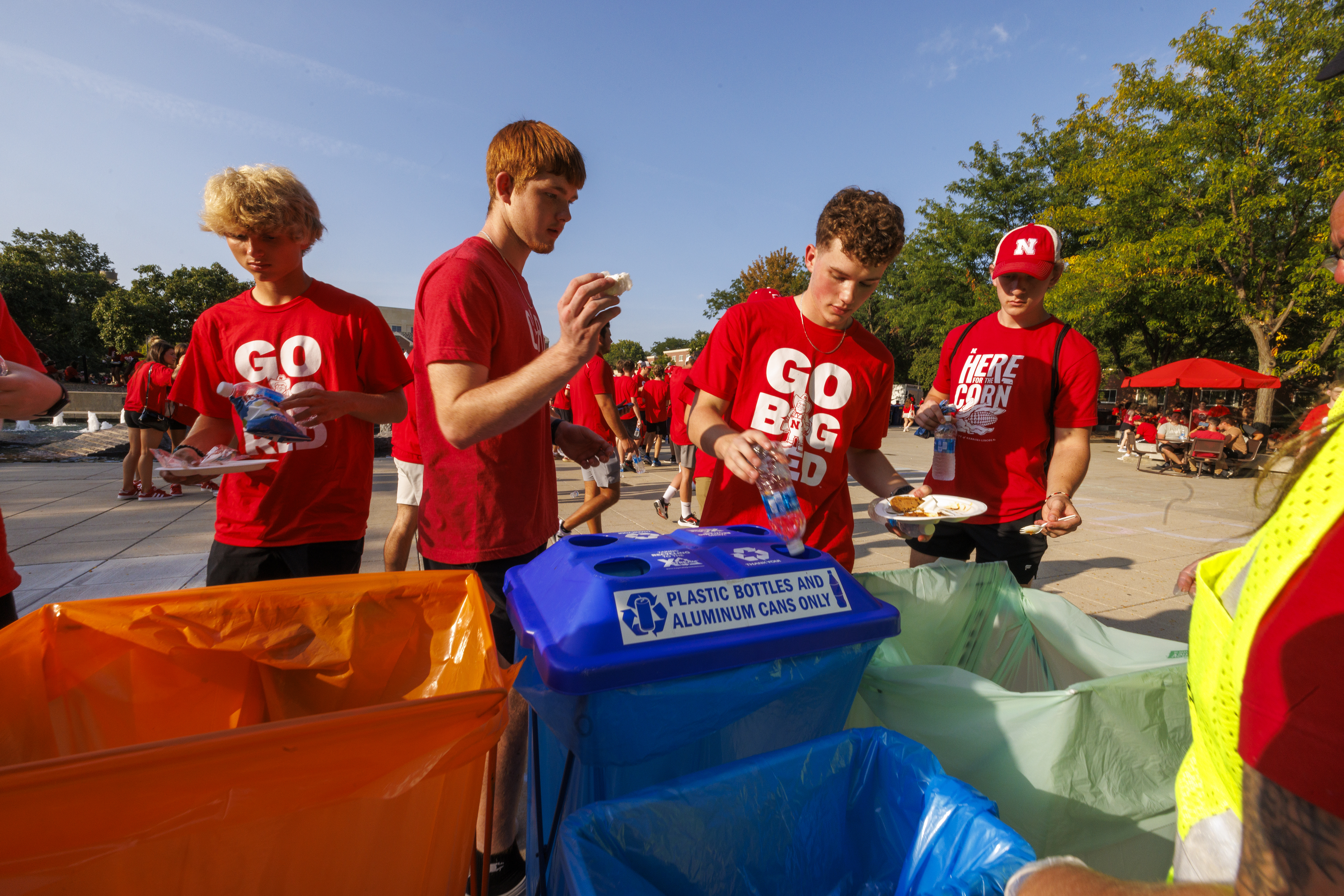Students sort the waste produced at the 2024 Chancellor's BBQ into compost, recycling, and landfill.